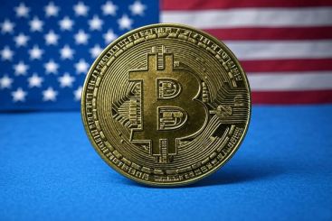 BTC coin on american flag